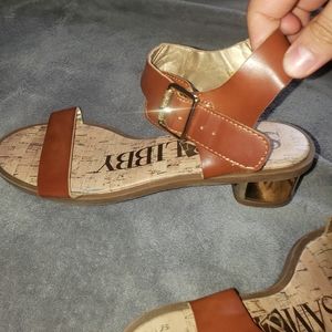 blue and dark tan shoes